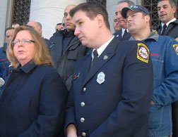 Attorney Karen Torre and firefighter Frank Ricci. Click image to expand.