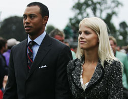 Tiger Woods and his wife Elin. Click image to expand.