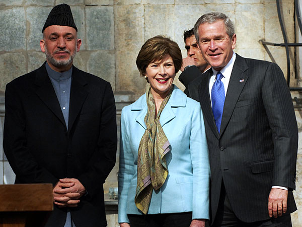 Afghan President Hamid Karzai, first lady Laura Bush, and U.S. President George W. Bush.