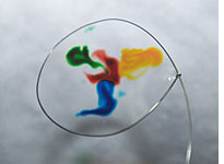 Food coloring on a thin water film.