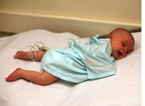 Walker with tubes in his left foot and wires taped to his chest 
Click image to expand.