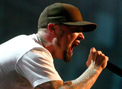 Limp Bizkit performs on stage.