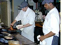 In K-Paul’s kitchen, the chefs have the heat on high