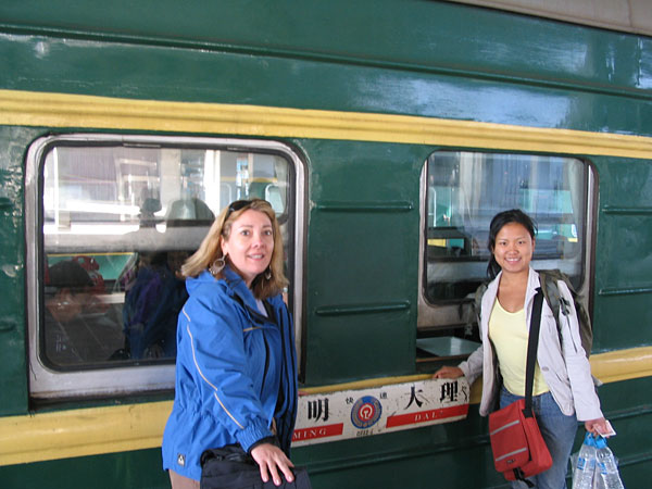 Cynthia and Candy board the train.