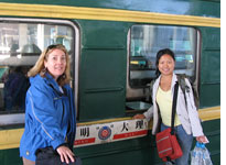Cynthia and Candy board the train. Click image to expand.