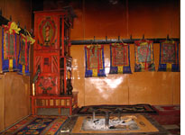 The hearth or "grandmother's" room in a Lugu home. Click image to expand.