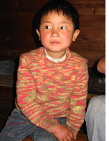 Sada watches a soap opera. Click image to expand.