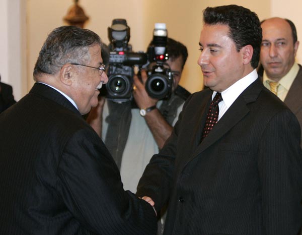 Turkish Foreign Minister Ali Babacan and Iraqi President Jalal Talabani.
