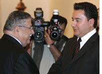 Turkish Foreign Minister Ali Babacan with Iraq's President Jalal Talabani.