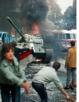 Residents of Prague try to stop a Soviet tank. Click image to expand.