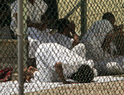 Guantanamo detainees praying. Click image to expand.