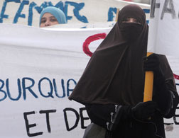French woman wearing a burqa. Click image to expand.