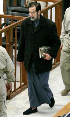 Saddam Hussein in caftan.
