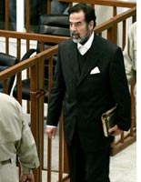 Saddam Hussein in suit, minus tie
Click image to expand.