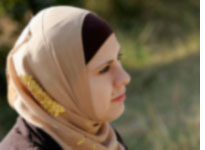 A woman wearing a headscarf