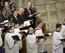 Obamas attend church prayer service. Click image to expand.