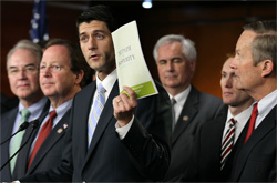 U.S. Rep. Paul Ryan holds a copy of the 2012 Republican budget proposal. Click image to expand.