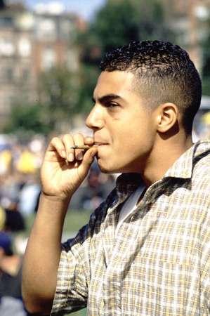 A student smokes a joint.