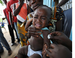 Photo of baby receiving Yellow Fever vaccine by Kambou Sia/AFP/Getty Images