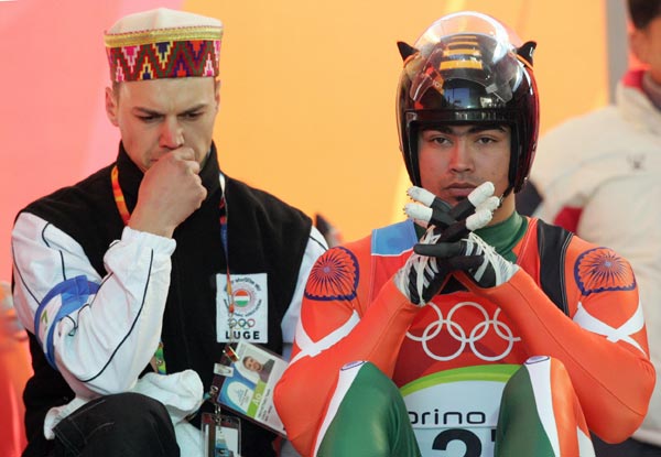India's Shiva Keshavan (right) and coach.