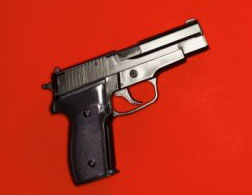 Close-up of a gun.