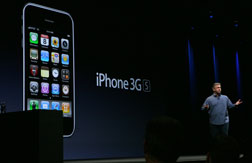 Apple's Phil Schiller announces a new iPhone. Click image to expand.
