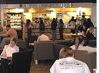 Students studying between classes in the student union. Click image to expand.