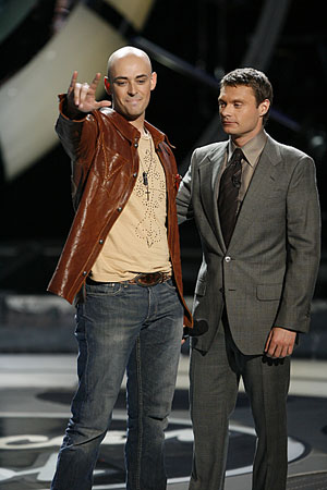 Phil Stacey (left) and Ryan Seacrest on American Idol.