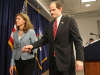 Photograph of Silda and Eliot Spitzer by Mario Tama/Getty Images.