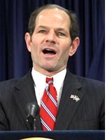 Photograph of Eliot Spitzer by Timothy A. Clary/AFP/Getty Images.