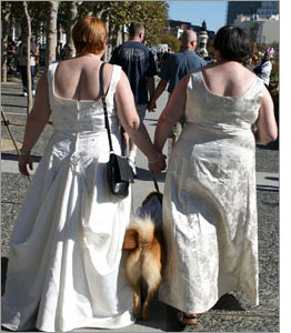 Photo of a same-sex couple in wedding gowns at an anti-Prop 8 rally by Justin Sullivan/Getty Images.