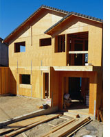 House Under Construction. Photograph by Ryan McVay/PhotoDisc/Getty Images.