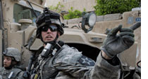 Photograph of a soldier in Iraq by David Furst/Getty Images.