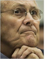 Photograph of Donald Rumsfeld by Paul J. Richards/AFP/Getty Images.