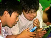 Japanese youth playing video games