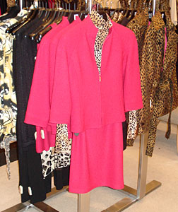 A raspberry collarless suit from St. John. Click image to expand.