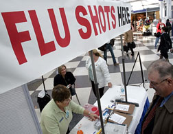 People line up for flu shots. Click image to expand.