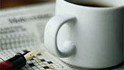 Coffee cup with crossword.