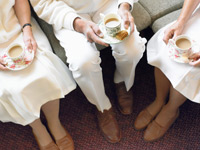 Photo of people sharing tea by Digital Vision.