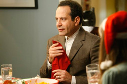Tony Shalhoub as Adrian Monk on MONK.