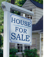 Photograph of for-sale sign by Ryan McVay/Photodisc.