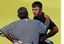  A PGA of America rules official chats with Dustin Johnson (R) by Sam Greenwood/Getty Images.
