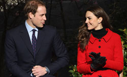Prince William sticks out his tongue at his darling Kate Middleton. Click image to expand.