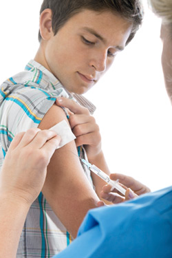 Boy getting a vaccine. Click image to expand.
