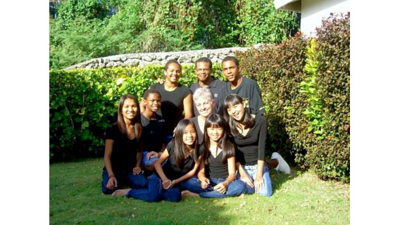 Tony and Judith Mosley with their two biological and five adopted children in 2007. Samuel is second from the left. At far left is the family?s Cambodian-born daughter, Camryn; in front of Judith are the three daughters the family adopted from Vietnam