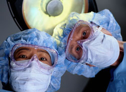 Doctors in operating room.