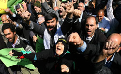 Iranians shout slogans during a protest in Tehran. Click to expand image. 
