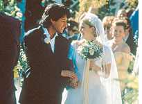Adam Sandler and Drew Barrymore in 'The Wedding Singer'. Click image to expand.