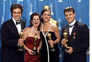 Winners Benicio Del Toro, Marcia Gay Harden, Julia Roberts, and Russell Crowe