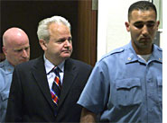 Milosevic: Defiant in the dock